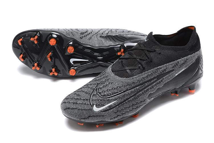 Chuteira Nike Phantom GX Low Elite FG Campo